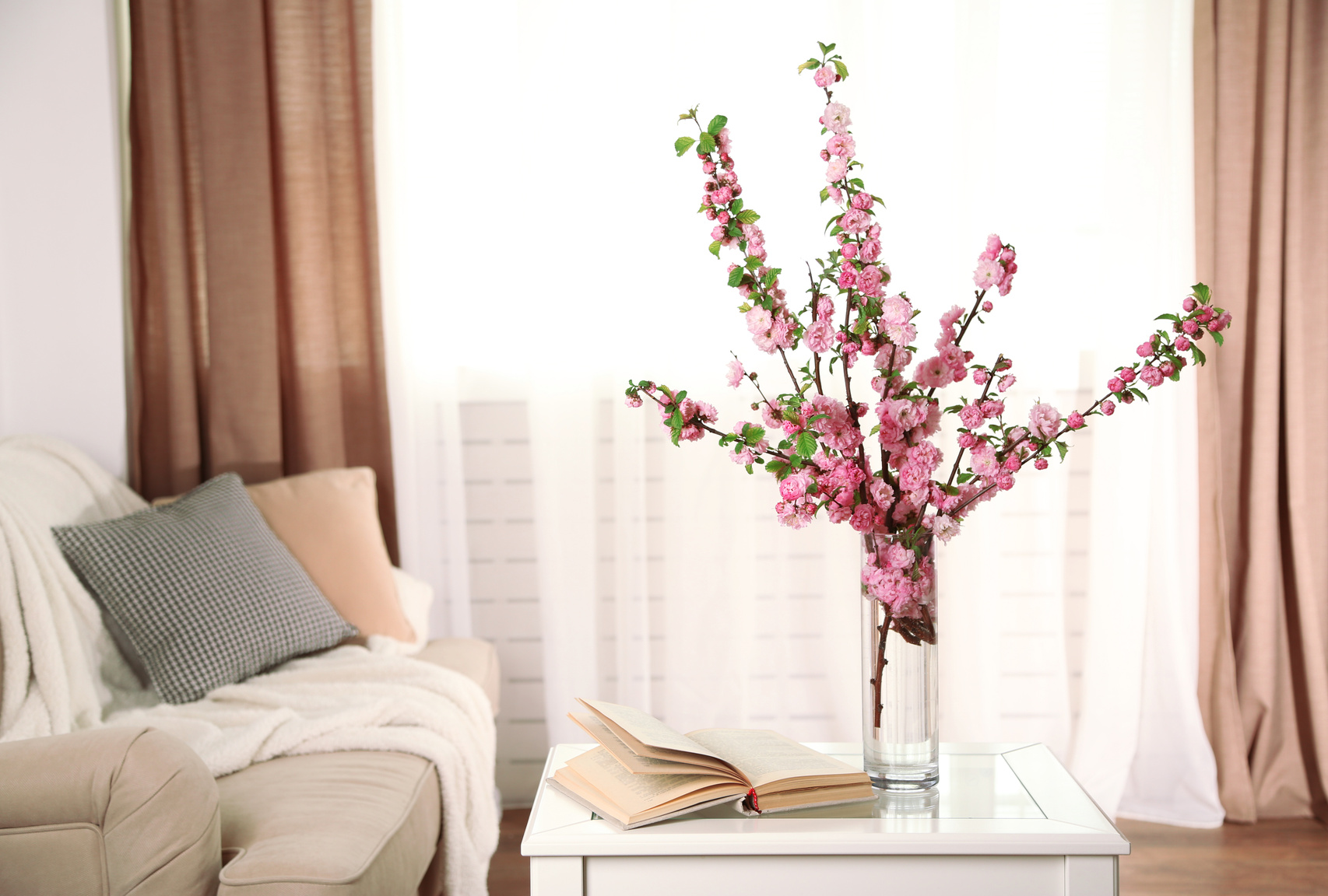 Spring Bouquet in Glass Vase in Cozy Living Room